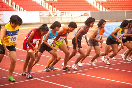 PHATUMTANI,THAILAND  SEPTEMBER,6  Groups of player action of 1500 m  in Thailand Open Athletic Championships 2013 at Thammashat University stadium on September 6,2013 in Phatumtani city ,Middle of Thailand  のeditorial素材