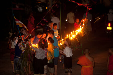 Candles in boat during Loykratong festival in Laos のeditorial素材