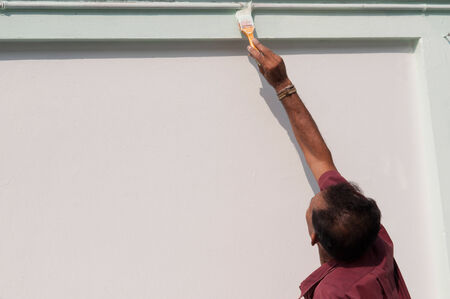 Male painting the wall の写真素材