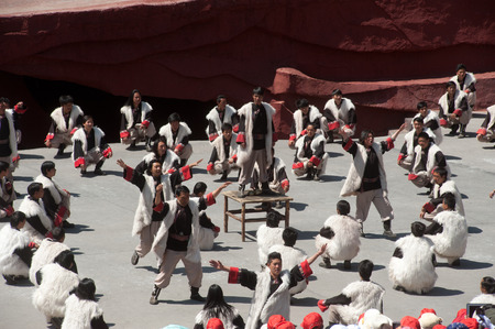 LIJIANG,CHINA-MARCH 16   Actors participate Impression Lijiang live performance on March 16,2014,at Yunnan Lijiang Ganhaizi Blue Moon theater in Lijiang, Yunnan Province at Southwestern of China のeditorial素材