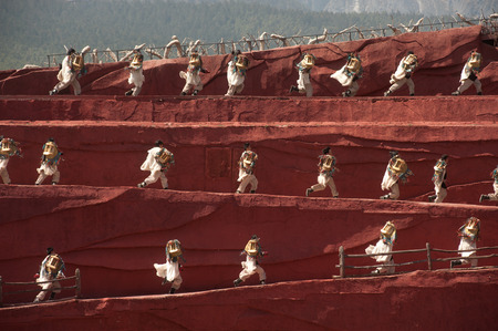 LIJIANG,CHINA-MARCH 16   Actors participate Impression Lijiang live performance on March 16,2014,at Yunnan Lijiang Ganhaizi Blue Moon theater in Lijiang, Yunnan Province at Southwestern of China のeditorial素材