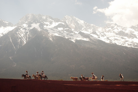 LIJIANG,CHINA-MARCH 16   Actors participate Impression Lijiang live performance on March 16,2014,at Yunnan Lijiang Ganhaizi Blue Moon theater in Lijiang, Yunnan Province at Southwestern of China のeditorial素材