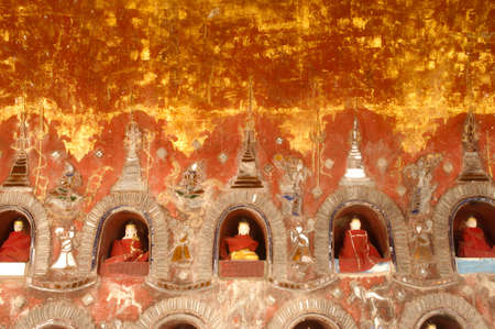 The Temple contains hundreds of Buddhas in alcoves on the wall, a spectacular site in pagoda of Nyan Shwe Kgua temple near Inle lake in Nyaungshwe,Myanmar.のeditorial素材