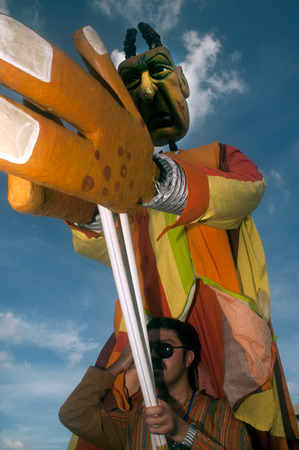 Actors holding puppets in Harmony World Puppet Carnival in Bangkok,Thailand 2014 parade.のeditorial素材