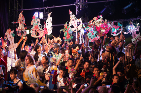Actors holding puppets in Harmony World Puppet Carnival in Bangkok,Thailand 2014 parade.のeditorial素材