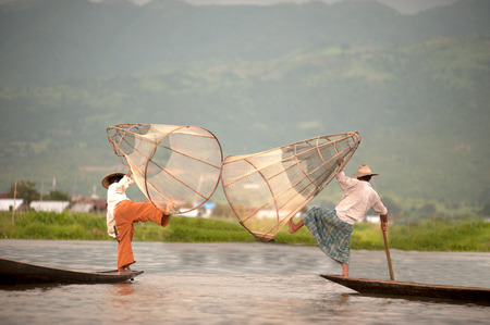 Traditional fishing by net in Inle lake,Shan State,Myanmar.