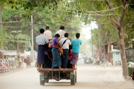 Little buses are common site in Myanmar.のeditorial素材