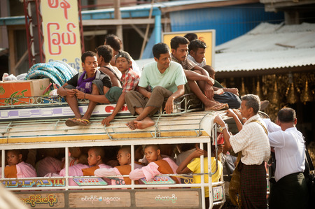 Little buses are common site in Myanmar.のeditorial素材