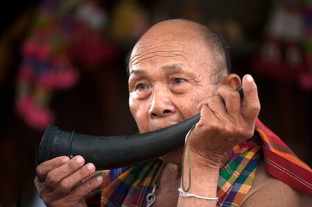 Face of senior mahout  in Ordination parade on elephant\'s back Festivalのeditorial素材
