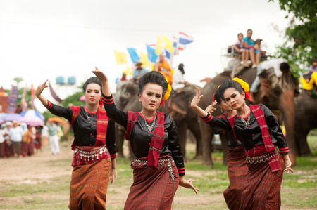 Group of traditional dancing in Ordination parade on elephant\'s back Festival.のeditorial素材