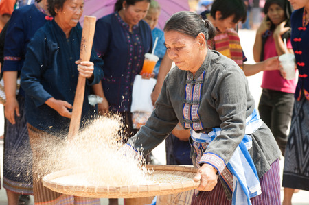 Unidentified Phutai minority competitive winnowing in The 2nd International Phutai Festival.のeditorial素材