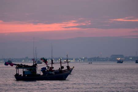 Fishing boat in sunset,Thailand.の写真素材