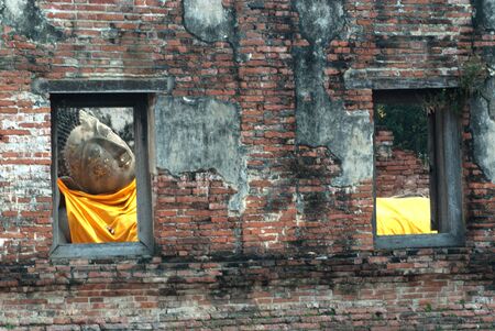 Ancient Reclining Buddha in Wat Puthai Sawan temple.の写真素材