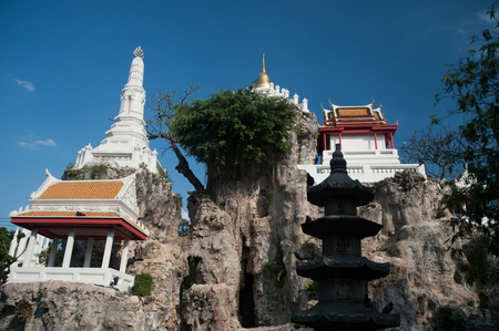 Khao Mo was built of stones.It look like a small mountain upper the small white pagoda. Located in Wat Prayurawongsawas Worawihan temple ,Thonburi, Bangkok, Thailand.の写真素材