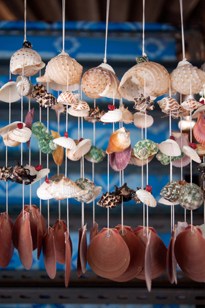 Blinds hand made of shells at Hua hin beach market, Thailand.の写真素材