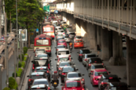 Blur traffic in main road with bokeh light, Bangkok Thailand abstract traffic light background.のeditorial素材
