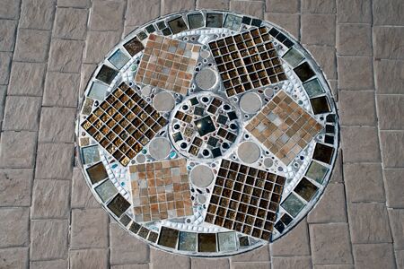 Hand made circular mosaic on Thai Buddhist Temple floor.のeditorial素材