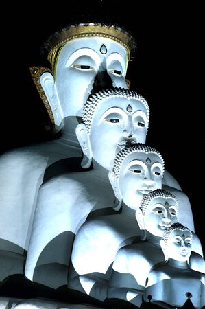 Face of Large outdoor Buddha statue on Khao Kho mountain at Wat Pha That Phra Sorn Kaew temple.の写真素材