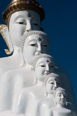 Face of Large outdoor Buddha statue on Khao Kho mountain at Wat Pha That Phra Sorn Kaew temple.の写真素材