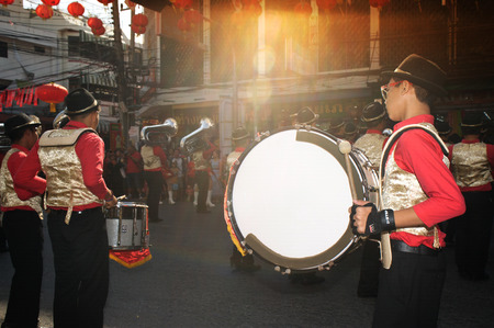 Marching in a parade during Chinese New Year Festival.のeditorial素材