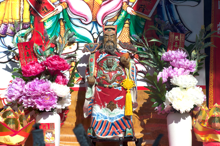 Statue of Chinese God Guan Yu on altar table.のeditorial素材