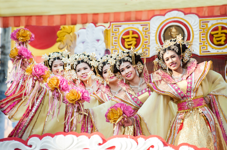 Group of Beautiful woman angel dancing show on parade in Chinese New Year festival.のeditorial素材