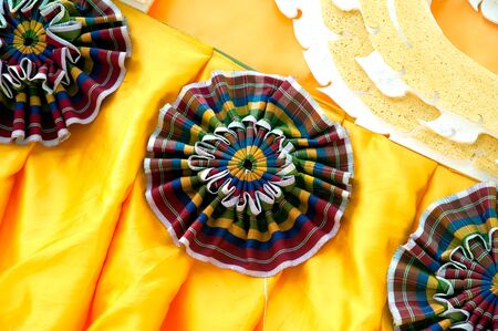 Traditional Thai Loincloths decorated on the car in the Rocket Festival parade show.の写真素材