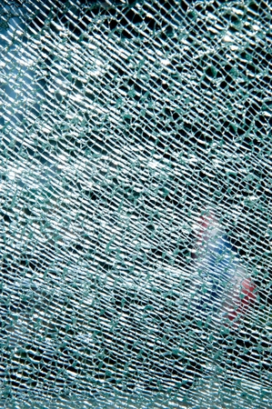 Abstract The car door glass is broken looking Thai flag outside.