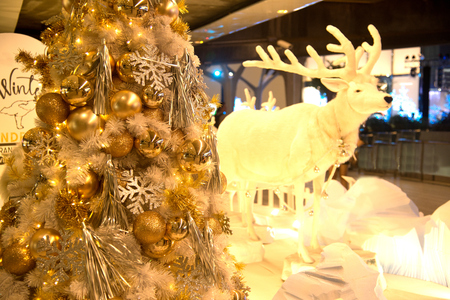 Bangkok , Thailand â December 18,2017 : Reindeer statue and light decorate beautiful on Christmas Tree Celebration 2018 at Emquartier Department store for Christmas day and Happy New Year  event on December 18 ,2017 in Bangkok capital city, Thailand.のeditorial素材
