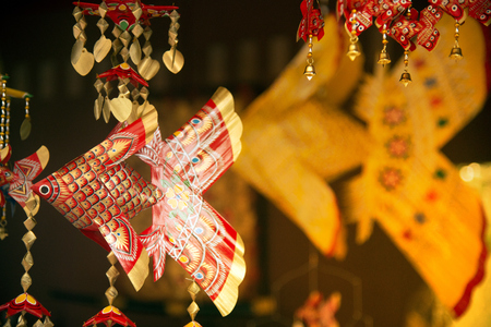 Traditional Thai Fish-shaped ornaments made of palm leaf made for showing in Thailand Tourism festival.の写真素材