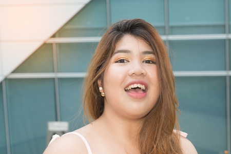 Portrait of Asian pretty smiley face fat woman posing.の写真素材