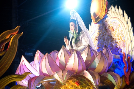 NAKHONSAWAN , THAILAND - FEBRUARY 18,2018 : Unidentified pretty woman is symbol Guan Yin of God on the night parade during Chinese New Year celebrations in Nakhonsawan Province , Middle of Thailand.のeditorial素材