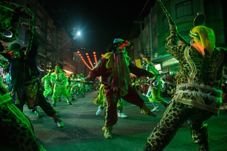 NAKORN SAWAN , THAILAND - FEBRUARY 18, 2018 : Group of unidentified fighting of warriors ( Aung-Gor ) dance on street in parade during Chinese New Year festival in Nakorn Sawan Province , Middle of Thailand.のeditorial素材