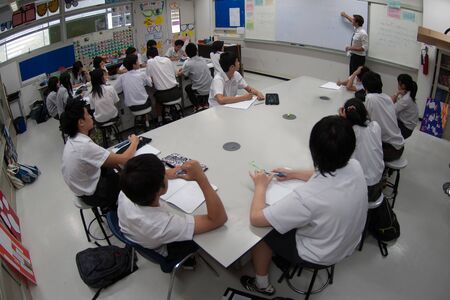BANGKOK,THAILAND - MARCH 30,2009 : Unidentified group of Asian elementary students are learning...
