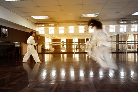 BANGKOK,THAILAND -MARCH 21,2009 : Unidentified young students are learning about skills training multi ethical karate position classroom at Amnuay Silpa school , Bangkok capital city, Thailand.のeditorial素材