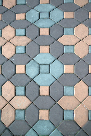 Top view outdoor texture and background colorful ceramic footpath floor in the city.