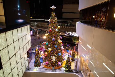 Light and doll decorate beautiful on Christmas Tree Celebration in Thailand.のeditorial素材