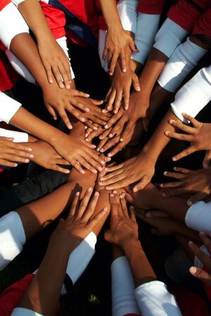 The unity of students and colleagues who complete activities and showing joy.の写真素材