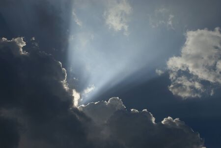 Sunset sky Vast on a sunny day with a bright beam and beautiful clouds.の写真素材