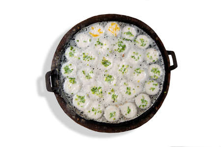 Kanom Krok or Kind of Thai sweetmeat, Thai dessert on a tray ,Making candy on white background.