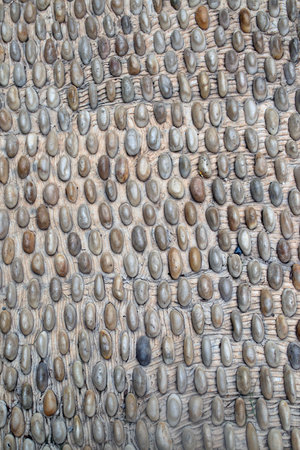 The pedestrian walkway is made from beautiful natural stone. Yellow brown Texture background for graphic design.の写真素材