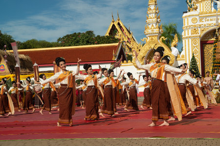 NAKHON PHANOM,THAILAND - OCT 2,2020 : Unidentified woman traditional dancing parade on the Wat Phra...