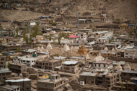 View landscape and cityscape of Leh Village with ruins Stupa or Chedi from viewpoint of Leh Stok...