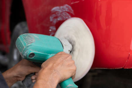 Close-up body repair tool for removing scratches, removing uneven paint and polishing cars.の写真素材