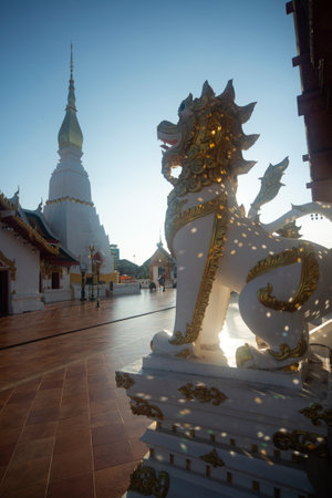 In the sunset, Lion acts to protect the place at Wat Phra That Choeng Chum Worawihan. Which is an important sacred place of the city since ancient timesのeditorial素材