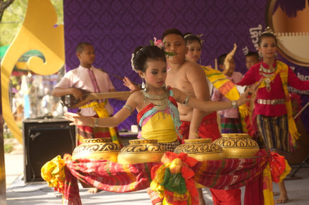 An unidentified of beautiful dancers perform a tourist show. At the Thai fair in the 232nd year of Rattanakosin city under Royal Benevolence in Bangkok, Thailand.のeditorial素材