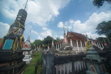 Mon churches and pagodas have square bases. The next pagoda base is an octagonal base. Some parts are decorated with stucco designs. At Wat Kongkaram Located in the Thailand.の写真素材