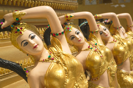 Statues of angels lined up in rows, beautiful, guarding and decorating the place at Wat Maneewong...
