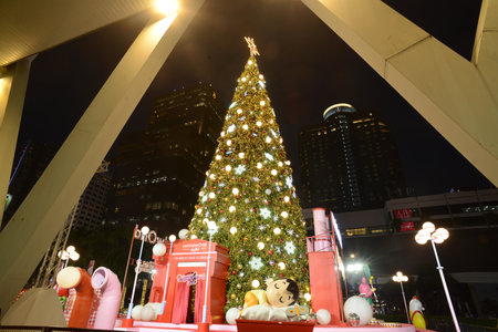 Bangkok ,Thailand - November 7 , 2024 : Light of Christmas tree and doll decorate beautiful on Christmas Tree Celebration 2025 at Central World Department store for Christmas day.のeditorial素材