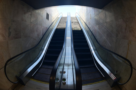 Escalator for going up and down to the subway.の写真素材